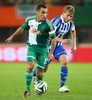 Steffen Hofmann (SK Rapid Wien) and Rasmus Schueller (HJK Helsinki) during a UEFA Europa League between SK Rapid Vienna and HJK Helsinki at the Ernst Happel Stadion, Wien, Austria on 2014/08/28.
