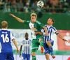 Roman Beric (SK Rapid Wien) and Teemu Tainio (HJK Helsinki) during a UEFA Europa League between SK Rapid Vienna and HJK Helsinki at the Ernst Happel Stadion, Wien, Austria on 2014/08/28.
