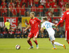 Valon Behrami of Switzerland and Kevin Kampl of Slovenia during UEFA European qualifiers football match between Slovenia and Switzerland. Match between Slovenia and Switzerland was played in arena Ljudski vrt in Maribor, Slovenia, on Thursday, 9th of October 2014.
