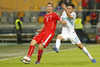 Stephan Lichtsteiner of Switzerland (L) and Andraz Kirm of Slovenia (R) during UEFA European qualifiers football match between Slovenia and Switzerland. Match between Slovenia and Switzerland was played in arena Ljudski vrt in Maribor, Slovenia, on Thursday, 9th of October 2014.

