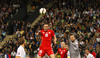 Josip Drmic of Switzerland trying to score, while goalie Samir Handanovic of Slovenia successfully defends his goal during UEFA European qualifiers football match between Slovenia and Switzerland. Match between Slovenia and Switzerland was played in arena Ljudski vrt in Maribor, Slovenia, on Thursday, 9th of October 2014.
