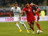 Josip Drmic of Switzerland (R) and Valter Birsa of Slovenia (L) during UEFA European qualifiers football match between Slovenia and Switzerland. Match between Slovenia and Switzerland was played in arena Ljudski vrt in Maribor, Slovenia, on Thursday, 9th of October 2014.
