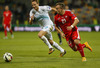 Xherdan Shaqiri of Switzerland (R) and Ales Mertelj of Slovenia (L) during UEFA European qualifiers football match between Slovenia and Switzerland. Match between Slovenia and Switzerland was played in arena Ljudski vrt in Maribor, Slovenia, on Thursday, 9th of October 2014.
