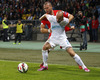 Miso Brecko of Slovenia (L) and Pajtim Kasami of Switzerland (R) during UEFA European qualifiers football match between Slovenia and Switzerland. Match between Slovenia and Switzerland was played in arena Ljudski vrt in Maribor, Slovenia, on Thursday, 9th of October 2014.
