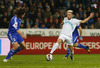 Kevin Kampl of Slovenia (R) and Davide Simoncini of San Marino (L) and  during UEFA European qualifiers football match between Slovenia and San Marino. UEFA European qualifiers atch between Slovenia and San Marino was played in Stozice arena in Ljubljana, Slovenia, on Friday, 27th of March 2015.
