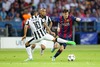 Carlos Tevez #10 (Juventus Turin), Arturo Vidal #23 (Juventus Turin) and Lionel Messi #10 (FC Barcelona) during the UEFA Champions League final match between Juventus FC and Barcelona FC at the Olympia Stadion in Berlin, Germany on 2015/06/06.
