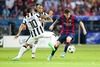 Carlos Tevez #10 (Juventus Turin), Arturo Vidal #23 (Juventus Turin) and Lionel Messi #10 (FC Barcelona) during the UEFA Champions League final match between Juventus FC and Barcelona FC at the Olympia Stadion in Berlin, Germany on 2015/06/06.
