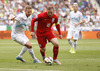 Wayne Rooney (no.10) of England (R) and Ales Mertelj of Slovenia (L)during UEFA European qualifiers football match between Slovenia and England. UEFA European qualifiers match between Slovenia and England was played in Stozice arena in Ljubljana, Slovenia, on Sunday, 14th of June 2015.
