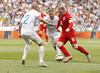 Wayne Rooney (no.10) of England (R), Miso Brecko of Slovenia (L) and Ales Mertelj of Slovenia (M) during UEFA European qualifiers football match between Slovenia and England. UEFA European qualifiers match between Slovenia and England was played in Stozice arena in Ljubljana, Slovenia, on Sunday, 14th of June 2015.
