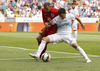 Branko Ilic of Slovenia (R) and Wayne Rooney (no.10) of England (L) during UEFA European qualifiers football match between Slovenia and England. UEFA European qualifiers match between Slovenia and England was played in Stozice arena in Ljubljana, Slovenia, on Sunday, 14th of June 2015.
