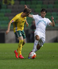 Arvydas Novikovas of Lithuania (L) and Rene Krhin of Slovenia (R) during UEFA European qualifiers football match between Slovenia and England. UEFA European qualifiers match between Slovenia and Lithuania was played in Stozice arena in Ljubljana, Slovenia, on Friday, 9th of October 2015.
