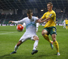 Andraz Struna of Slovenia (L) and Deimantas Petravicius of Lithuania (R) during UEFA European qualifiers football match between Slovenia and England. UEFA European qualifiers match between Slovenia and Lithuania was played in Stozice arena in Ljubljana, Slovenia, on Friday, 9th of October 2015.
