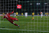 Arvydas Novikovas of Lithuania scoring from penalty shot during UEFA European qualifiers football match between Slovenia and England. UEFA European qualifiers match between Slovenia and Lithuania was played in Stozice arena in Ljubljana, Slovenia, on Friday, 9th of October 2015.
