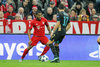 Douglas Costa (FC Bayern Muenchen) and Alex Sanchez (FC Arsenal London) during the UEFA Champions League group F match between FC Bayern Munich and FC Arsenal at the Allianz Arena in Muenchen, Germany on 2015/11/04.
