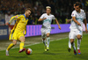 Andriy Yarmolenko of Ukraine (L) attacking next to Kevin Kampl of Slovenia (M) and Rene Krhin of Slovenia (R) during UEFA European qualifiers play-off football match between Slovenia and Ukraine. UEFA European qualifiers play-off match between Slovenia and Ukraine was played in Ljudski vrt arena in Maribor, Slovenia, on Tuesday, 17th of November 2015.
