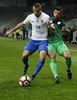 Lukas Pauschek (no.14) of Slovakia (L) and Bojan Jokic (no.13) of Slovenia during football match of FIFA World cup qualifiers between Slovenia and Slovakia. FIFA World cup qualifiers between Slovenia and Slovakia was played on Saturday, 8th of October 2016 in Stozice arena in Ljubljana, Slovenia.

