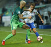 Aljaz Struna (no.23) of Slovenia and Dusan Svento (no.18) of Slovakia during football match of FIFA World cup qualifiers between Slovenia and Slovakia. FIFA World cup qualifiers between Slovenia and Slovakia was played on Saturday, 8th of October 2016 in Stozice arena in Ljubljana, Slovenia.
