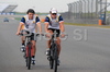 Fernando Alonso (ESP),  Renault F1 Team on bicycle before free practice for Formula 1 Grand Prix of China in Shanghai. Free practice for Formula 1 Grand Prix of China was held on 16th of September 2008 in Shanghai, China.
