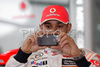 Lewis Hamilton (GBR), McLaren Mercedes takes a picture with a mobile phone during presentation of new Mclaren Mercedes Formula 1 race car. Presentation of Mclaren Mercedes Formula 1 team was held in Woking, Great Britain, on 17th of January 2009.
