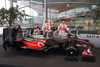 Heikki Kovalainen (FIN) and Lewis Hamilton (GBR) with their McLaren Mercedes MP4-24 during presentation of new Mclaren Mercedes Formula 1 race car. Presentation of Mclaren Mercedes Formula 1 team was held in Woking, Great Britain, on 17th of January 2009.
