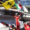 Sebastian Vettel (Scuderia Ferrari) celebrates with Ferrari and Italian flag after winning the race of the Hungarian Formula One Grand Prix at the Hungaroring in Budapest, Hungary on 2015/07/26.
