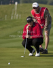 Shane Lowry (IRL) lines up a putt on day one of the Celtic Manor Wales Open 2010, in the Celtic Manor Resort and Golf Club, part of the Race to Dubai tournament.
