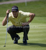 Martin Kaymer (GER) lines up a putt on day one of the Celtic Manor Wales Open 2010, in the Celtic Manor Resort and Golf Club, part of the Race to Dubai tournament.
