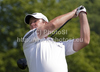Marcus Fraser (AUS) playing a shot on day one of the Celtic Manor Wales Open 2010, in the Celtic Manor Resort and Golf Club, part of the Race to Dubai tournament.
