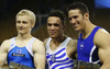 Winner Eleftherios Petrounias of Greece (M), second placed Markku Vahtila of Finland (L) and third placed Alexander Naddour of USA (R) celebrate their medals won in competition on rings of Artistic gymnastics World Challenge Cup Ljubljana 2013, which was held on Saturday, 27th of April 2013 in Tivoli Arena in Ljubljana, Slovenia
