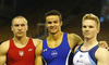 Winner Paul Ruggeri of USA (M), second placed Marek Lyszczarz of Poland (L) and third placed Tomi Tuuha of Finland (R) celebrate their medals won in men vault competition of Artistic gymnastics World Challenge Cup Ljubljana 2013, which was held on Saturday, 27th of April 2013 in Tivoli Arena in Ljubljana, Slovenia
