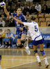 Andreja Lekic (no.19) of Krim (M) shooting on goal between Aneta Peraica (no.5) of HC Lokomotiva Zagreb (R) and Petra Starcek (no.15) of HC Lokomotiva Zagreb (L) during match of 1/8 finals match of Women Handball Cup Winners cup. Match between RK Krim, Ljubljana, Slovenia, and RK Lokomotiva Zagreb, Croatia was played on 9th of February 2008 in Tivoli Arena in Ljubljana, Slovenia. Match ended with victory of RK Krim, who defeated RK Lokomotiva Zagreb 31:25.
