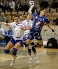 Andreja Lekic (no.19) of Krim (R) shooting on goal next to Vesna Milanovic Litre (no.13) of HC Lokomotiva Zagreb (L) during match of 1/8 finals match of Women Handball Cup Winners cup. Match between RK Krim, Ljubljana, Slovenia, and RK Lokomotiva Zagreb, Croatia was played on 9th of February 2008 in Tivoli Arena in Ljubljana, Slovenia. Match ended with victory of RK Krim, who defeated RK Lokomotiva Zagreb 31:25.
