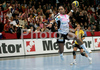 Katty Piejos (no.10) of Metz Handball shooting on goal during second round match of Women Champions league between RK Krim, Ljubljana, Slovenia, and Metz Handball, Metz, France. Match between RK Krim and Metz Handball was played on 9th of November 2008 in Kodeljevo Arena in Ljubljana, Slovenia. Match ended with victory of Metz, who defeated RK Krim with 26:31.
