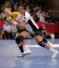 Ivana Lovric (no.8) of Metz Handball (R) attacking next to Tamara Mavsar (no.8) of RK Krim (L) during second round match of Women Champions league between RK Krim, Ljubljana, Slovenia, and Metz Handball, Metz, France. Match between RK Krim and Metz Handball was played on 9th of November 2008 in Kodeljevo Arena in Ljubljana, Slovenia. Match ended with victory of Metz, who defeated RK Krim with 26:31.
