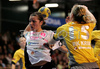 Ivana Lovric (no.8) of Metz Handball (L) shooting on goal next to Barbara Varlec (no.15) of RK Krim (R) during second round match of Women Champions league between RK Krim, Ljubljana, Slovenia, and Metz Handball, Metz, France. Match between RK Krim and Metz Handball was played on 9th of November 2008 in Kodeljevo Arena in Ljubljana, Slovenia. Match ended with victory of Metz, who defeated RK Krim with 26:31.
