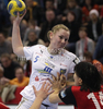 Anne Ulbricht (no.5) of HC Leipzig (M) between Andreja Lekic (no.77) of Krim Mercator (L) and Liudmila Bodnieva (no.14) of Krim Mercator (R) during match of EHF Women Handball Champions League between RK Krim Mercator and HC Leipzig. Match of EHF Women Champions League between RK Krim Mercator, Ljubljana, Slovenia and HC Leipzig, Germany, was played in Kodeljevo Arena, Ljubljana, Slovenia, on Saturday, 13th of February 2010. Match was won by RK Krim Mercator, who defeated HC Leipzig with 32-26.
