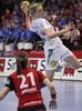 Susann Muller (no.22) of HC Leipzig scoring during match of EHF Women Handball Champions League between RK Krim Mercator and HC Leipzig. Match of EHF Women Champions League between RK Krim Mercator, Ljubljana, Slovenia and HC Leipzig, Germany, was played in Kodeljevo Arena, Ljubljana, Slovenia, on Saturday, 13th of February 2010. Match was won by RK Krim Mercator, who defeated HC Leipzig with 32-26.
