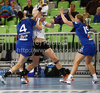 Rikke Skov (no.2) of Viborg HK (M) between Ibolya Weiszne Mehlmann (no.4) of RK Krim Mercator (L) and Kristina Bille (no.19) of RK Krim Mercator (R) during match of EHF Women Handball Champions League between RK Krim Mercator and Viborg HK. Match of EHF Women Champions League between RK Krim Mercator, Ljubljana, Slovenia and Viborg HK, Denmark, was played in Stozice Arena, Ljubljana, Slovenia, on Friday, 7th of October 2011.
