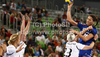 Andrea Penezic (no.23) of RK Krim Mercator (R) shooting over Anja Althaus (no.23) of Viborg HK (L) during match of EHF Women Handball Champions League between RK Krim Mercator and Viborg HK. Match of EHF Women Champions League between RK Krim Mercator, Ljubljana, Slovenia and Viborg HK, Denmark, was played in Stozice Arena, Ljubljana, Slovenia, on Friday, 7th of October 2011.
