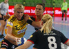 Jenny Alm (no.15) of IK Savehof (L) attacking while Tamara Mavsar (no.8) of RK Krim Mercator (R) and Daniela Piedade (no.5) of RK Krim Mercator (M) trying to stop her during match of first round of EHF Women handball Champions League between RK Krim Mercator, Slovenia, and IK Savehof, Sweden. Match of EHF Women handball Champions League between RK Krim Mercator and IK Savehof was played on Saturday, 5th of October 2013 in Stozice arena in Ljubljana, Slovenia.
