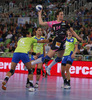 Yvette Broch (no.14) of Metz Handball (R) shooting next to Daniela Piedade (no.5) of RK Krim Mercator (L) during match of EHF Women handball Champions League between RK Krim Mercator, Slovenia, and Metz Handball, France. Match of EHF Women handball Champions League between RK Krim Mercator and Metz Handball was played on Saturday, 2nd of November 2013 in Stozice arena in Ljubljana, Slovenia.
