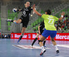 Saskia Lang (no.18) of HC Leipzig (L) shooting on goal over Oana Andreea Manea (no.77) of RK Krim Mercator (R) during match of EHF Women handball Champions League between RK Krim Mercator, Slovenia, and HC Leipzig, Germany. Match of EHF Women handball Champions League between RK Krim Mercator and HC Leipzig was played on Saturday, 16th of November 2013 in Stozice arena in Ljubljana, Slovenia.
