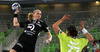 Saskia Lang (no.18) of HC Leipzig (L) shooting on goal over Oana Andreea Manea (no.77) of RK Krim Mercator (R) during match of EHF Women handball Champions League between RK Krim Mercator, Slovenia, and HC Leipzig, Germany. Match of EHF Women handball Champions League between RK Krim Mercator and HC Leipzig was played on Saturday, 16th of November 2013 in Stozice arena in Ljubljana, Slovenia.
