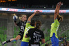 Saskia Lang (no.18) of HC Leipzig (L) shooting on goal over Oana Andreea Manea (no.77) of RK Krim Mercator (R) during match of EHF Women handball Champions League between RK Krim Mercator, Slovenia, and HC Leipzig, Germany. Match of EHF Women handball Champions League between RK Krim Mercator and HC Leipzig was played on Saturday, 16th of November 2013 in Stozice arena in Ljubljana, Slovenia.

