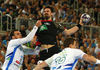 Nik Henigman of Slovenia (L) Fabian Wiede of Germany (M) and Vid Poteko of Slovenia (R) during EHF European championships qualifications match between Slovenia and Germany. EHF European championships qualifications match between Slovenia and Germany was played on Wednesday, 3rd of May 2017 in Stozice arena in Ljubljana, Slovenia.
