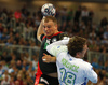 Paul Drux of Germany and David Miklavcic of Slovenia during EHF European championships qualifications match between Slovenia and Germany. EHF European championships qualifications match between Slovenia and Germany was played on Wednesday, 3rd of May 2017 in Stozice arena in Ljubljana, Slovenia.
