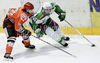  Marjan Manfreda (no 18) of HK Acroni Jesenice and Brock McBride (no 10) of HDD Tilia Olimpija during ice hockey match of Slovenian league finals 2011-2012 between HK Acroni Jesenice and HDD Tilia Olimpija. Match between HK Acroni Jesenice and HDD Tilia Olimpija was held on Monday, 2nd of April 2012 in Jesenice, Slovenia. 
