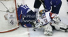 Andrej Tavzelj (4) of Slovenia and goalkeeper Robert Kristan of France during the match of EICH Ice hockey tournament between Slovenia and France. Match between Slovenia and France  was held in Tivoli Arena in Ljubljana, Slovenia, on Friday, 9th of November 2012. during match of EIHC ice hockey tournament between Slovenia and France. Match between Slovenia and France was played in Tivoli Arena in Ljubljana, Sloveni, on Friday, 9th of November 2012. Match was won by Slovenia, who defeated France with 3-1.
