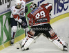 Marcel Rodman (no.22) of Slovenia and Bernhard Starkbaum (no.29) of Austria during match of EIHC Ice hockey tournament between Slovenia and Austria. Match between Slovenia and Austria was held in Ljubljana Hala Tivoli arena, Slovenia, on Saturday, 10th of November 2012.
