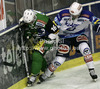 Ales Music (16) of HDD Telemach Olimpija and Stefan Batcher of EC VSV during match of EBEL league Ice hockey tournament between HDD Telemach Olimpija and EC VSV, Villach. Match between HDD Telemach Olimpija and EC VSV, Villach was held in Ljubljana Hala Tivoli arena, Slovenia, on Friday, 16th of November 2012.

